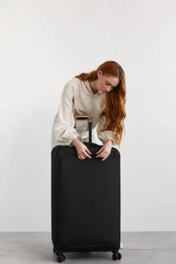 Soft-Sided Collapsible Check-In Roller In Black