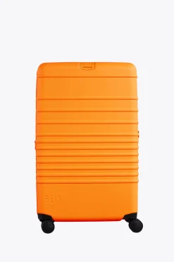 The 29" Large Check-In Roller In Creamsicle